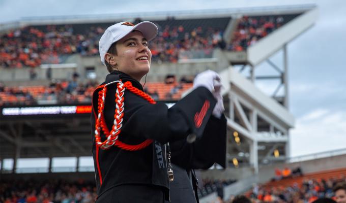Linus Unitan is a drum major and sousaphone player in Oregon State's marching band. 