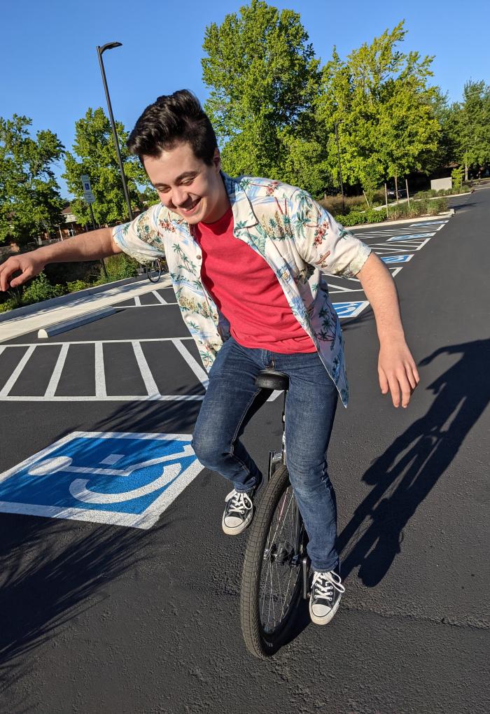 Linus Unitan enjoys riding his unicycle around campus.