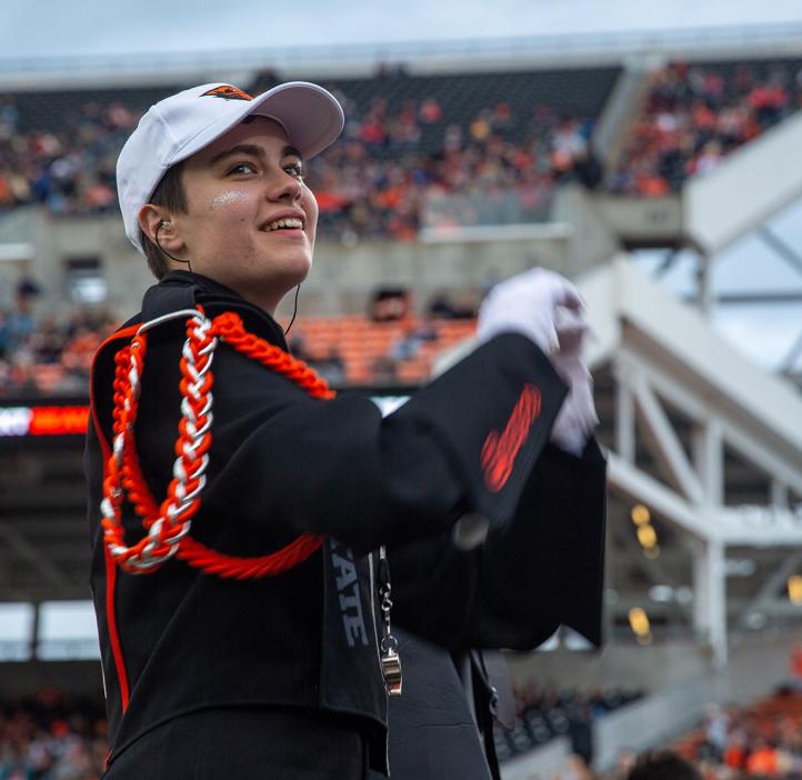 Linus Unitan is a drum major and sousaphone player in Oregon State's marching band. 