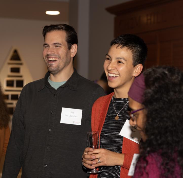 A photo of people talking or laughing at the Alumni Awards event