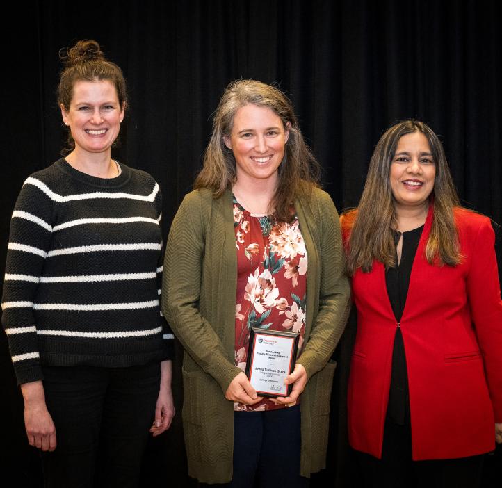 Jenna Sullivan-Stack receives her award at the 2024 Winter Awards Ceremony at Oregon State University.